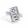 ring features two massive Cushion-cut diamonds set in a dramatic vertical orientation