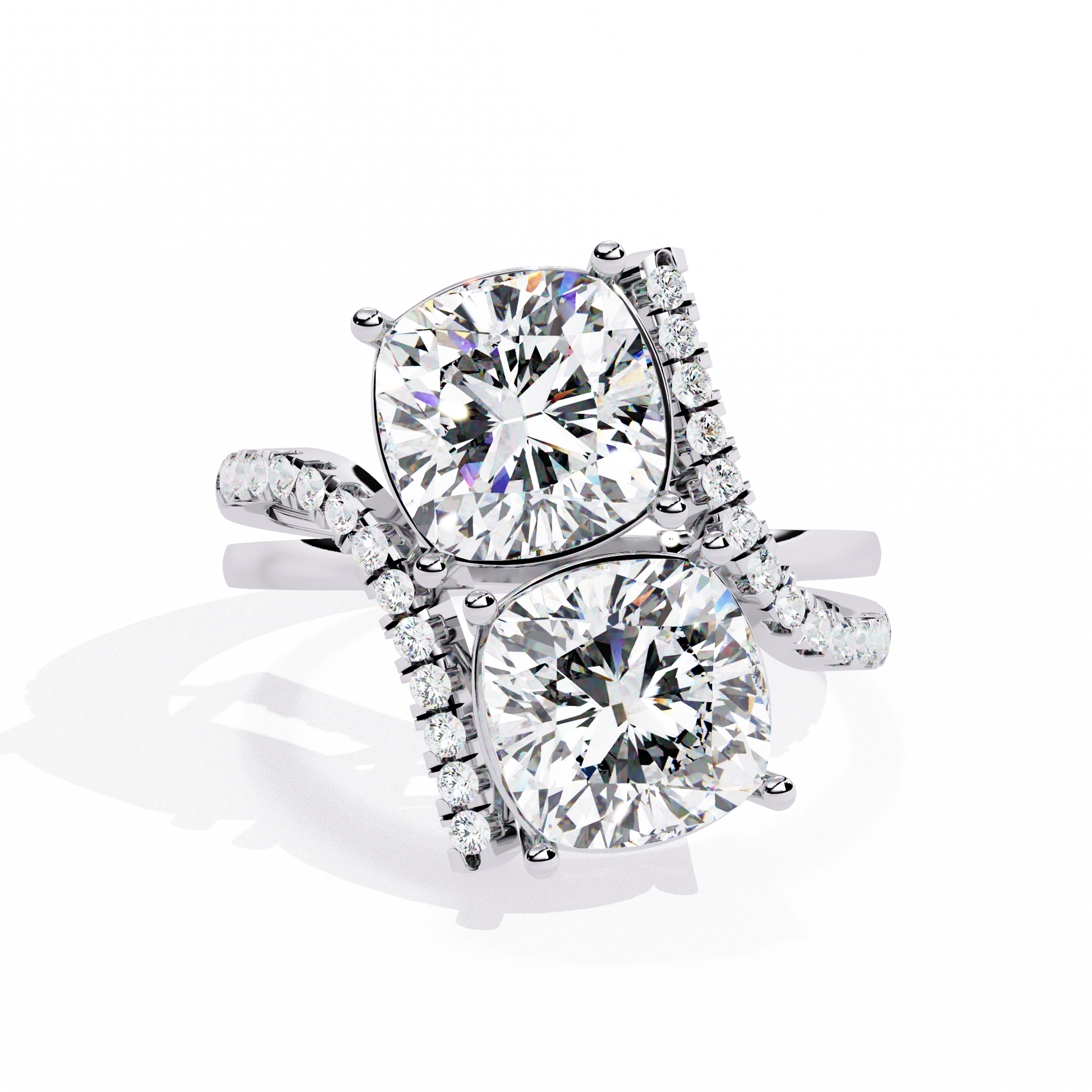 ring features two massive Cushion-cut diamonds set in a dramatic vertical orientation