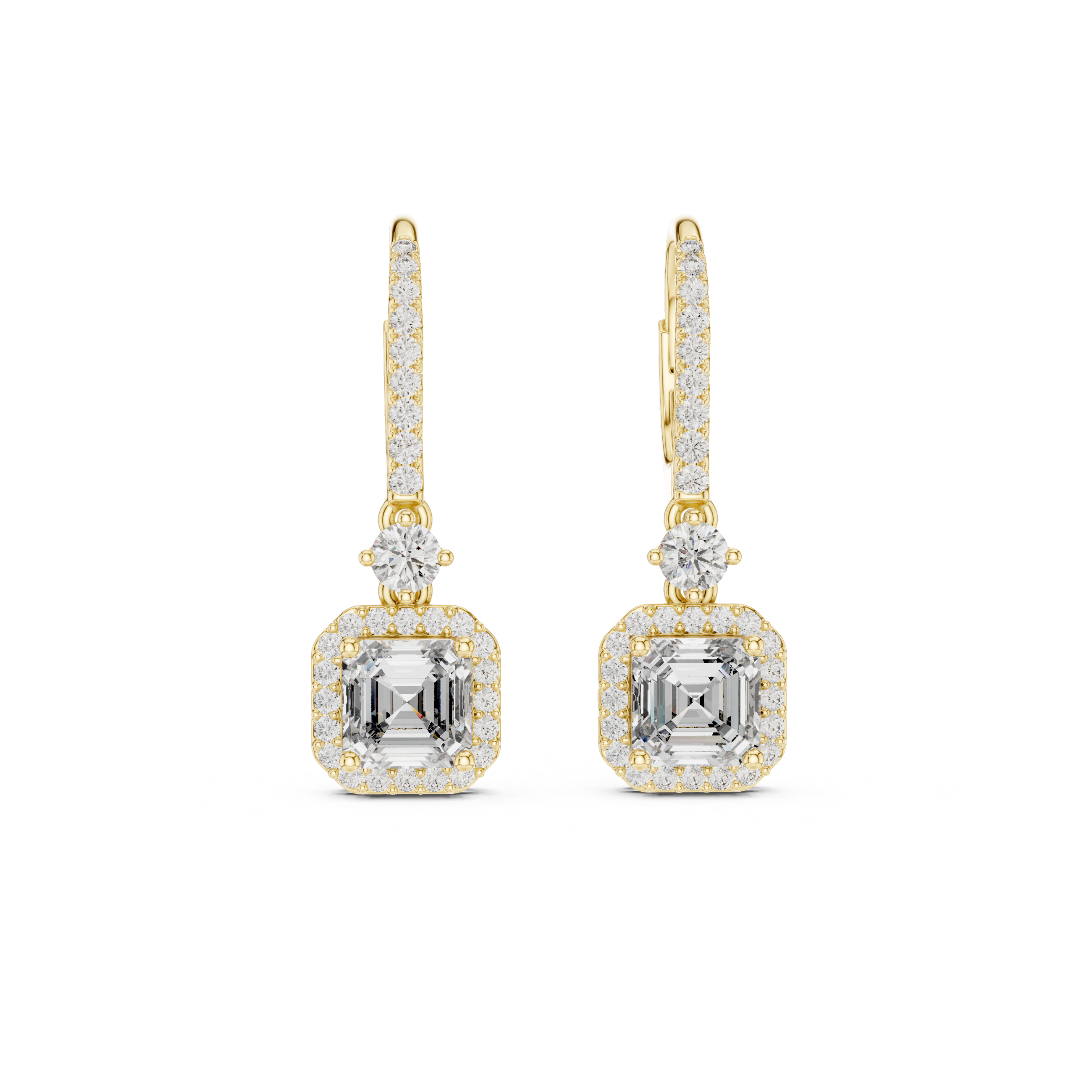 Gold and diamond earrings on a white background