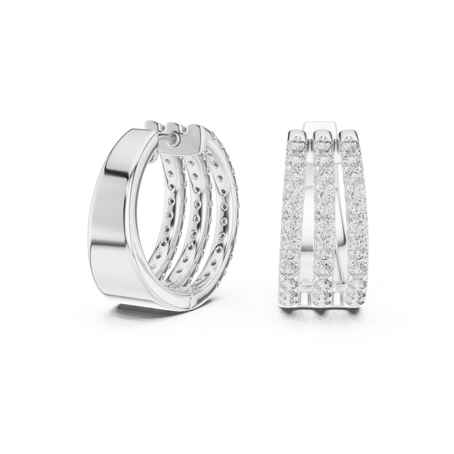 Silver hoop earrings with diamond accents on a white background
